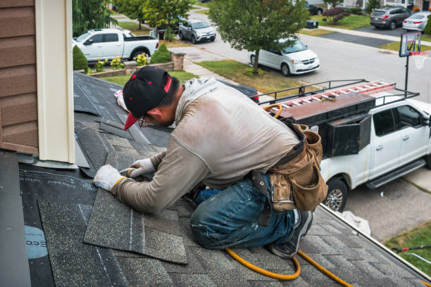 Professional Roofing technician working in Evansville, WI